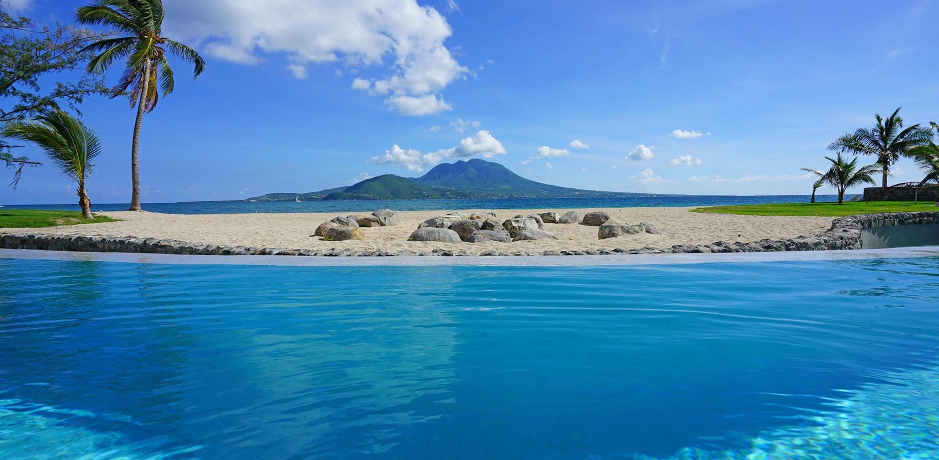 View of the Nevis peak across the water from St Kitts, Caribbean