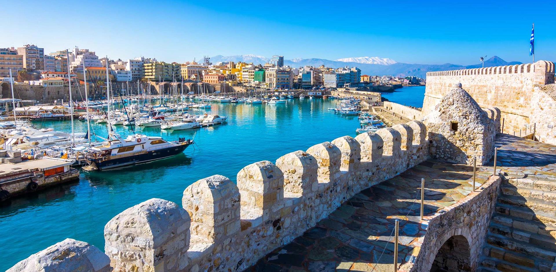 Heraklion harbour with old venetian fort Koule and shipyards, Crete